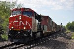 Eastbound stack train eases down the grade